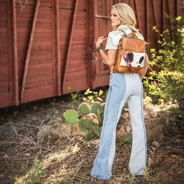 STS39940-cowhide-basic-bliss-backpack-lifestyle-3_600x_2bcb0d44-e895-442c-a61c-3bbd1baf3443